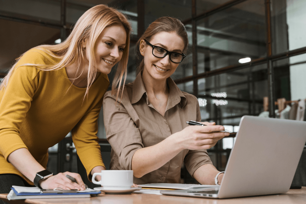 two employees using the time and attendance app